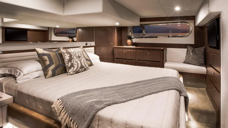 Slide: The Image of Luxurious bedroom interior of 2024 Belize 54 Daybridge yacht with elegant decor and modern amenities. - 16
