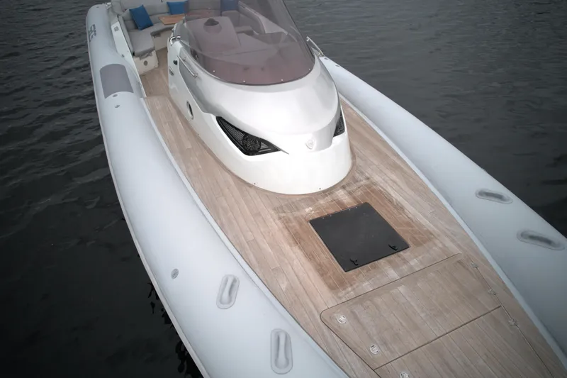 Slide: The Image of 2014 SACS Strider 13 luxury inflatable boat on water. - 12