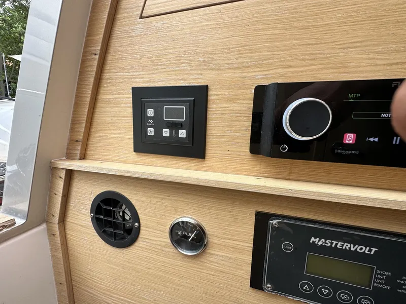 Slide: The Image of Control panel of a 2014 SACS Strider 13 boat with Mastervolt system. - 27