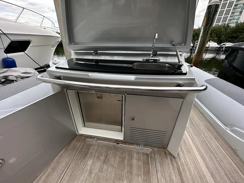 Slide: The Image of Outdoor kitchenette on a 2014 SACS Strider 13 yacht with a sink and storage. - 33