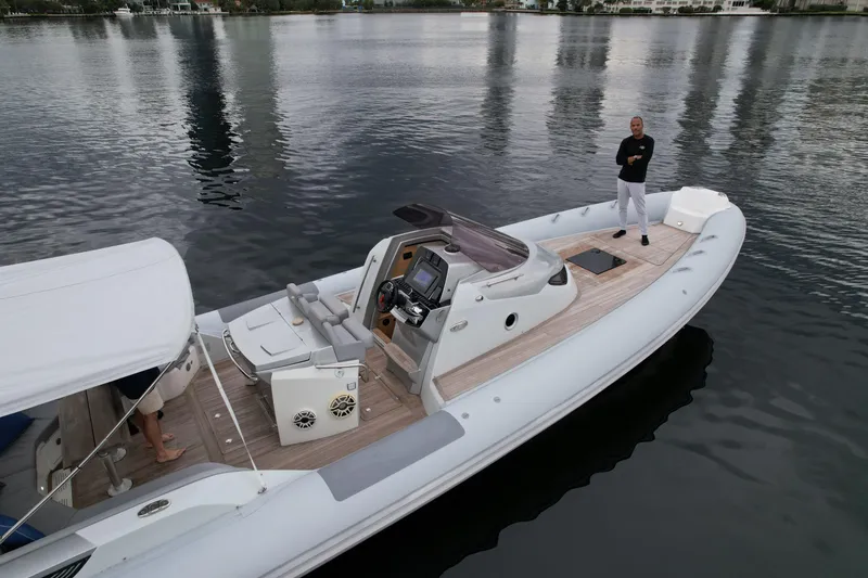 Slide: The Image of 2014 SACS Strider 13 luxury inflatable boat on calm water. - 38