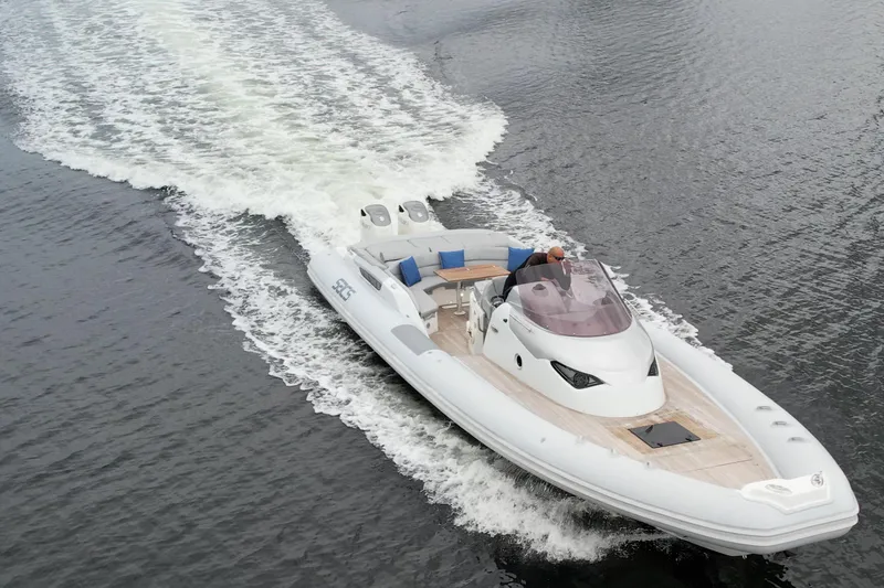 Slide: The Image of 2014 SACS Strider 13 luxury yacht cruising on water. - 43