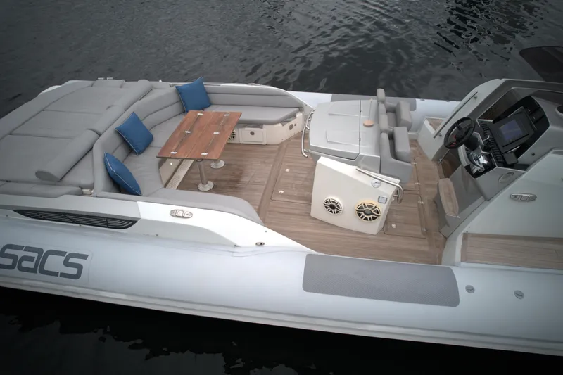 Slide: The Image of 2014 SACS Strider 13 luxury inflatable boat with spacious seating and modern amenities. - 9