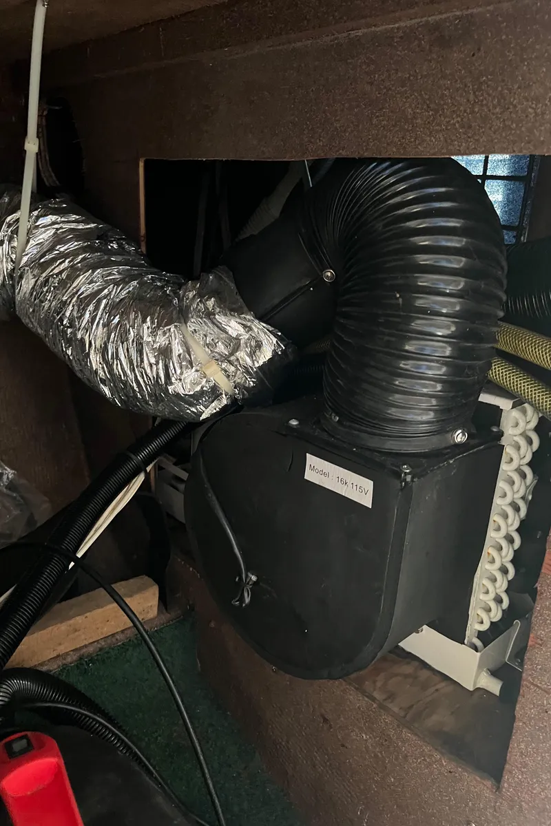 Slide: The Image of 1985 Custom Mabry Edwards HVAC system with ductwork and insulation. - 19