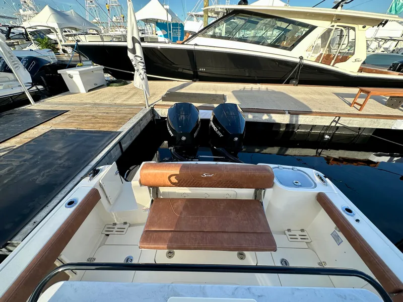 Slide: The Image of Scout 260 LXF 2025 at dock with dual engines. - 8