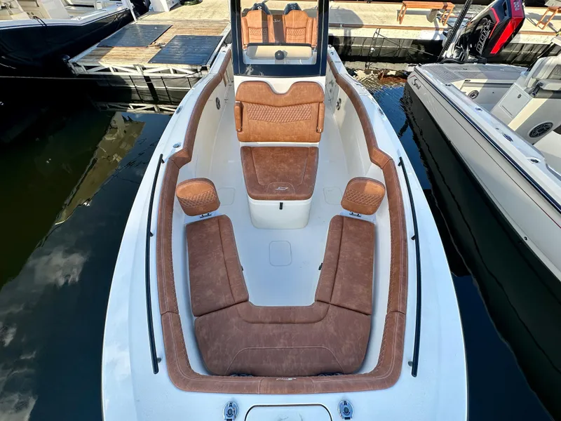 Slide: The Image of 2025 Scout 260 LXF with luxurious interior at the dock. - 9