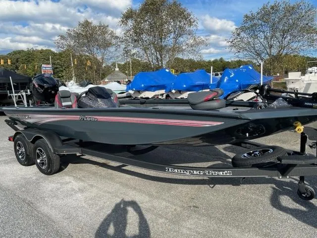 Slide: The Image of 2024 Ranger RT198P fishing boat on trailer, outdoor display. - 2