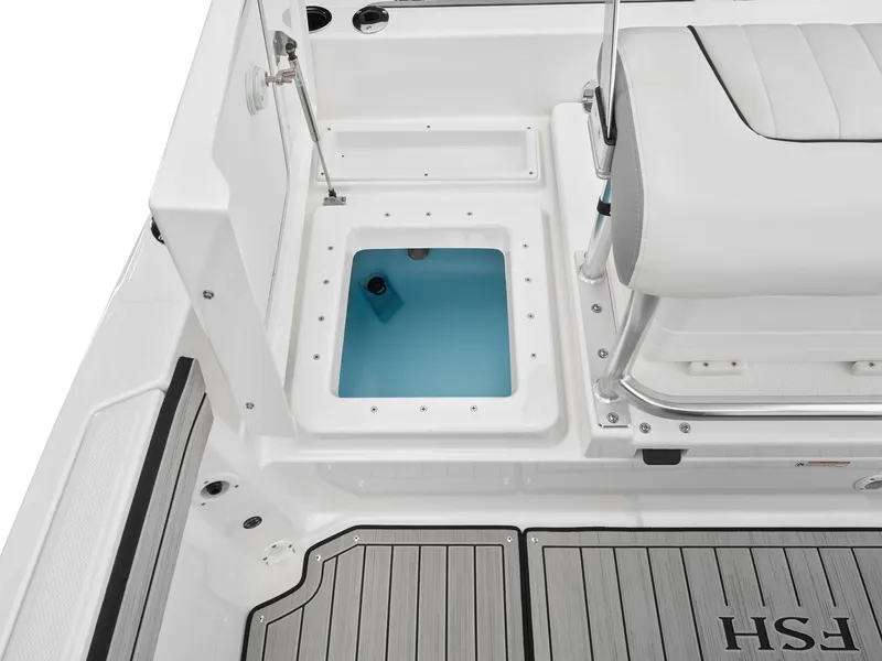 Slide: The Image of 2024 Yamaha Boats 195 FSH Sport interior, featuring a storage compartment and cushioned seating. - 4