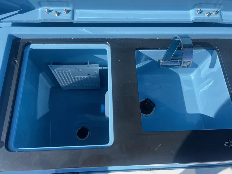 Slide: The Image of Dual sink setup in the 2023 BRABUS Shadow 500 Cabin boat. - 13