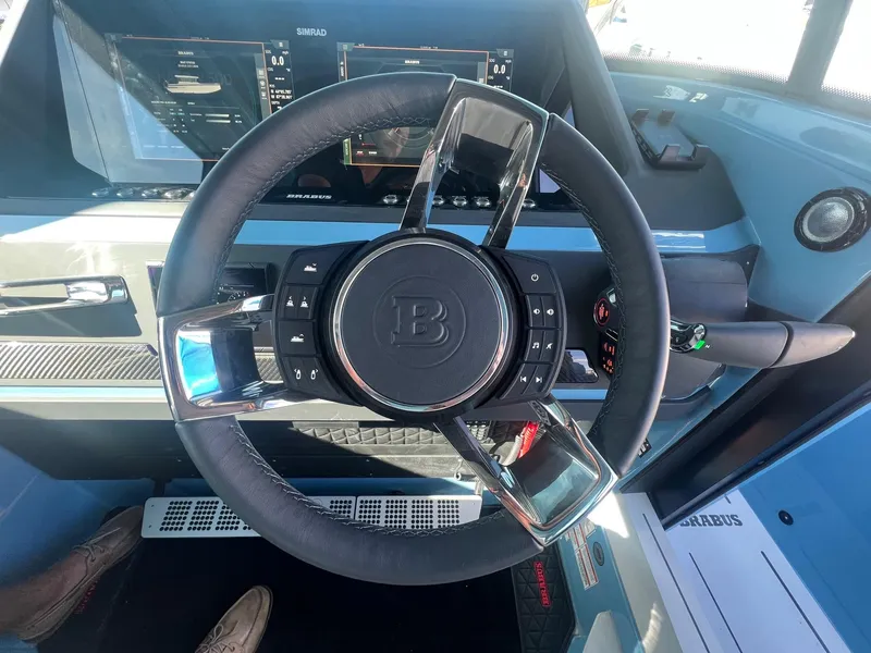 Slide: The Image of Steering wheel of the 2023 BRABUS Shadow 500 Cabin boat. - 19