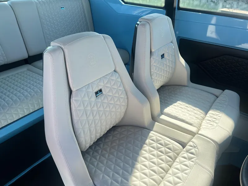 Slide: The Image of BRABUS Shadow 500 Cabin 2023 interior with luxurious quilted leather seats. - 22