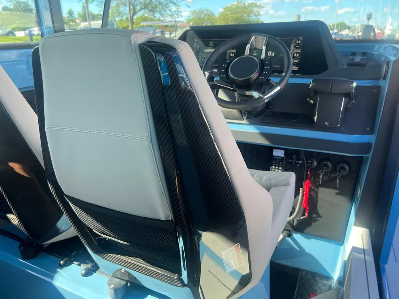 Slide: The Image of Interior of 2023 BRABUS Shadow 500 Cabin, featuring modern dashboard and steering wheel. - 23