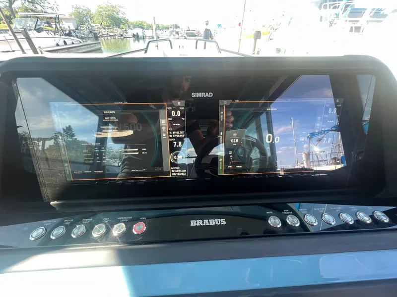 Slide: The Image of Control panel of 2023 BRABUS Shadow 500 Cabin boat with dual Simrad displays. - 26