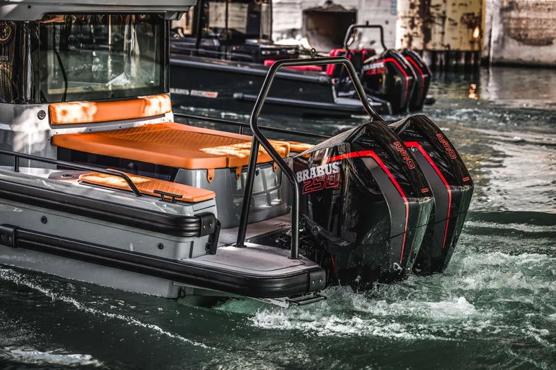 Slide: The Image of 2023 BRABUS Shadow 500 Cabin boat with twin engines in water. - 35