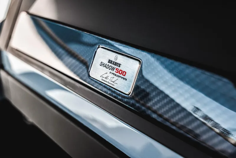 Slide: The Image of 2023 BRABUS Shadow 500 Cabin nameplate on carbon fiber panel. - 41
