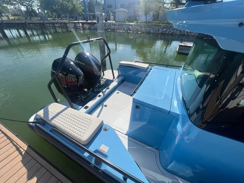 Slide: The Image of 2023 BRABUS Shadow 500 Cabin boat docked by the water. - 8