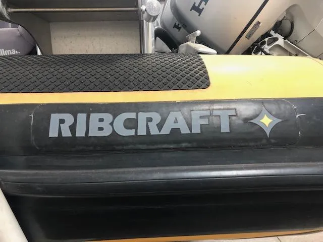 Slide: The Image of Ribcraft 9.0 inflatable boat, 2008 model, featuring logo and textured surface. - 13