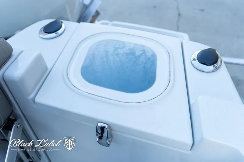 Slide: The Image of 2024 Finseeker 220 FinSeeker livewell with dual cup holders, by Black Label Marine Group. - 24