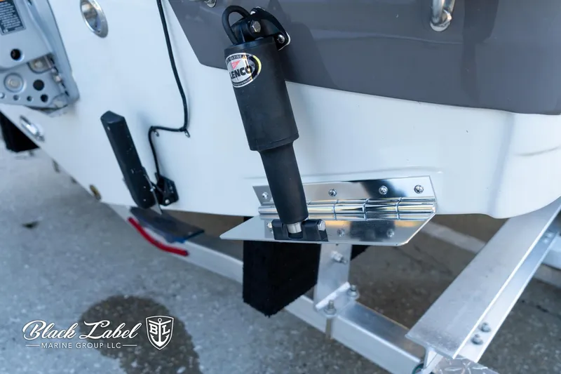 Slide: The Image of 2024 Finseeker 220 FinSeeker boat detail with trim tab and hydraulic actuator. - 29