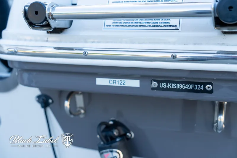 Slide: The Image of 2024 Finseeker 220 FinSeeker boat detail with identification numbers and Black Label Marine Group logo. - 3