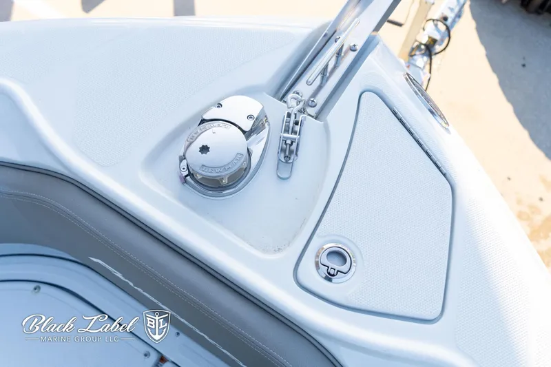 Slide: The Image of 2024 Finseeker 220 FinSeeker boat deck detail with Black Label Marine Group logo. - 8