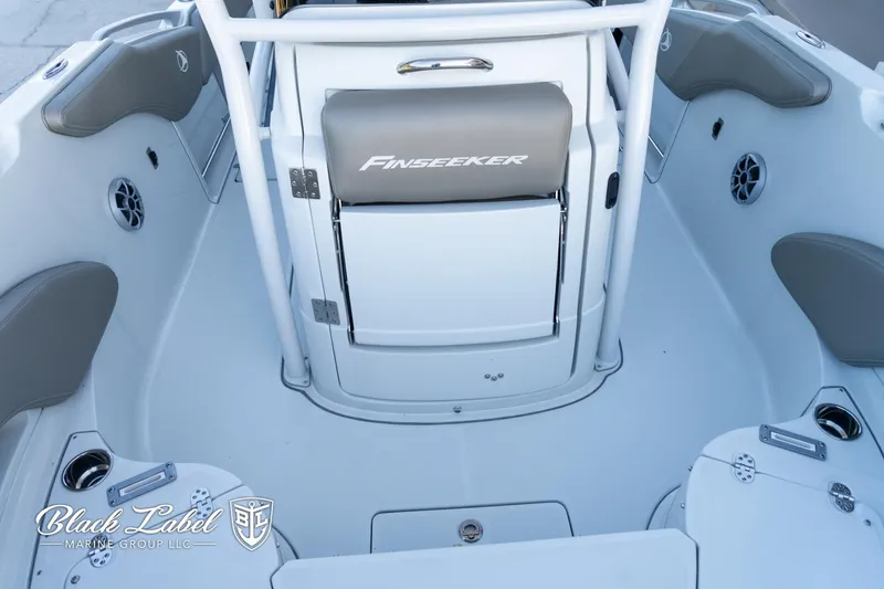 Slide: The Image of 2024 Finseeker 220 boat interior with seating and storage compartments. - 9