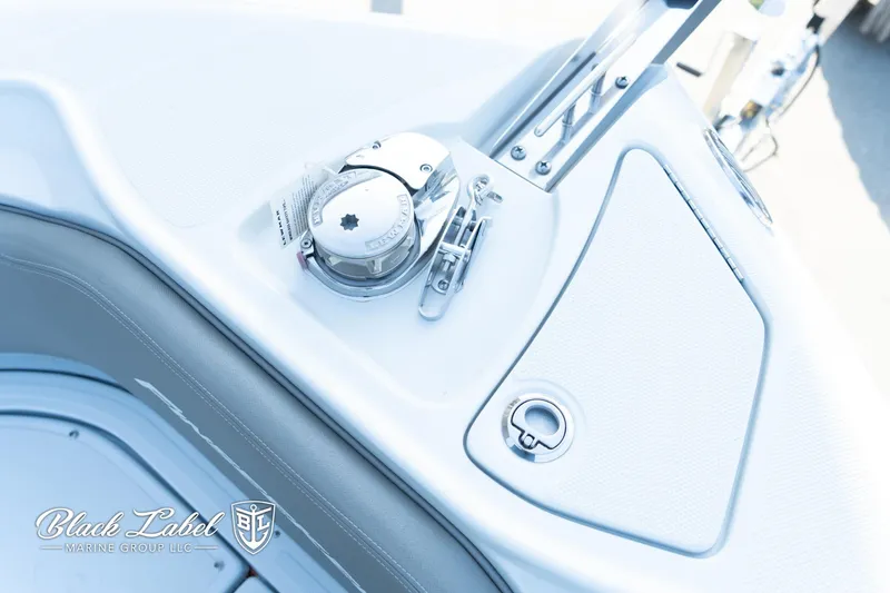 Slide: The Image of 2024 Finseeker 230 FinSeeker boat deck with control panel and fittings. - 13