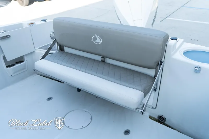 Slide: The Image of 2024 Finseeker 230 FinSeeker boat seat with logo, featuring sleek design and comfortable upholstery. - 27