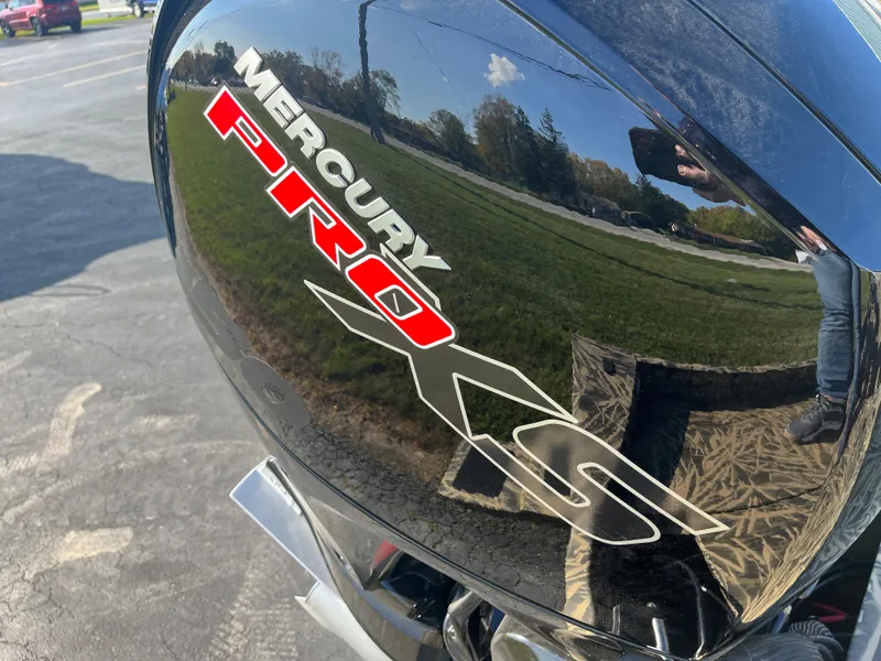 Slide: The Image of Close-up of Mercury Pro XS engine on 2024 Lowe Outlet 20 boat. - 22