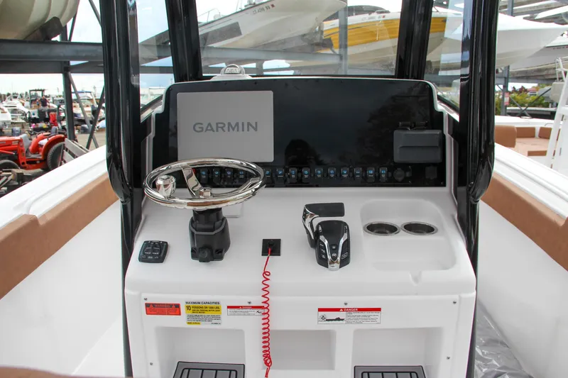 Slide: The Image of 2024 Sea Hunt Ultra 255 SE boat console with Garmin navigation system. - 35