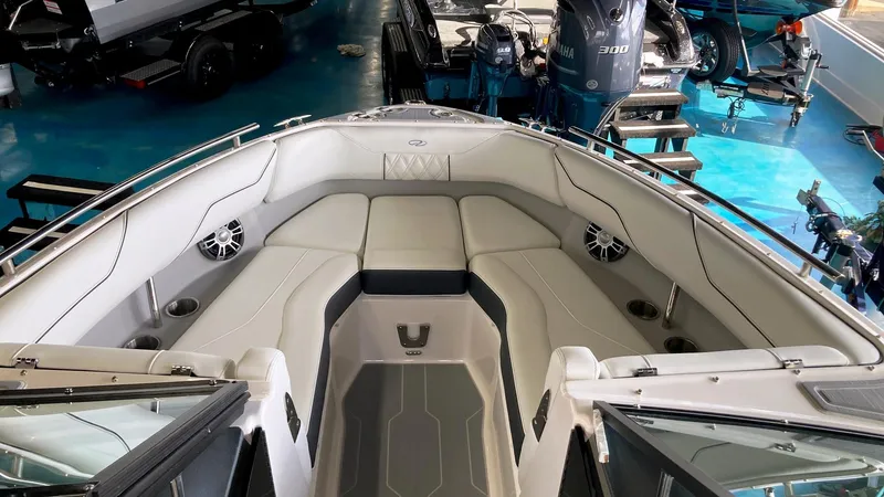 Slide: The Image of 2024 Regal LS4 Surf boat interior with spacious seating and modern design. - 10