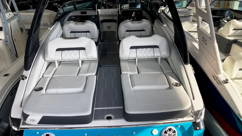 Slide: The Image of 2024 Regal LS4 Surf boat with luxurious seating and modern design. - 3