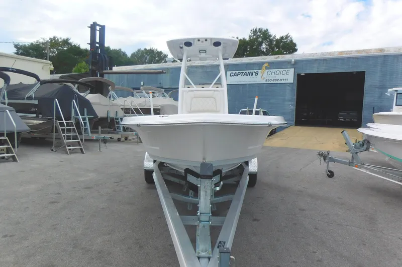 Slide: The Image of 2024 Blue Wave 2600 PureBay boat on trailer at Captain's Choice dealership. - 3