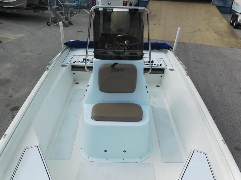 Slide: The Image of 2018 Excel 22'3 Bay Pro boat with center console and seating. - 10