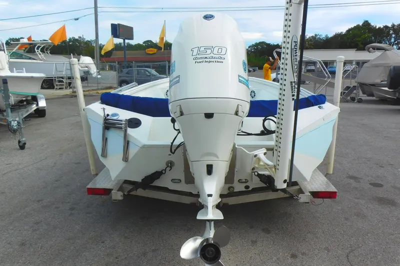 Slide: The Image of 2018 Excel 22'3 Bay Pro boat with 150 HP outboard motor, rear view. - 3