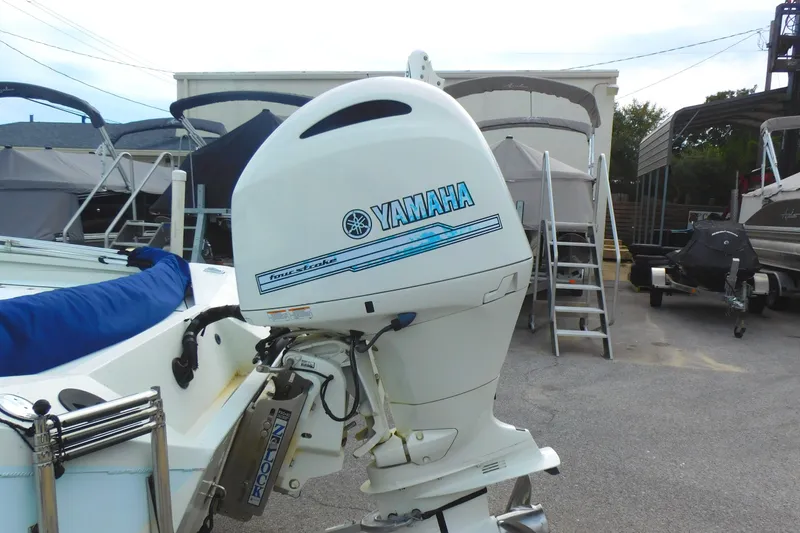 Slide: The Image of 2018 Excel 22'3 Bay Pro boat with Yamaha outboard motor. - 4