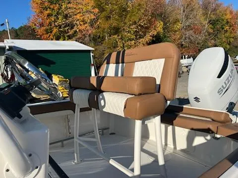 Slide: The Image of 2024 Pioneer 222 Islander boat interior with Suzuki outboard motor. - 4