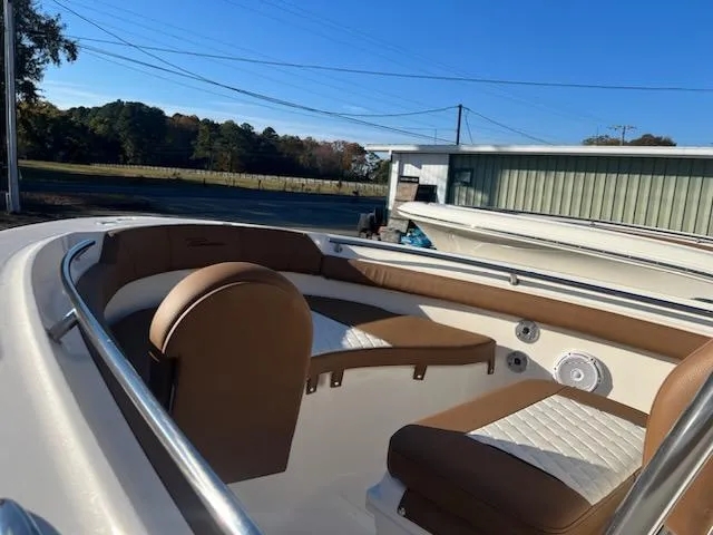 Slide: The Image of 2026 Pioneer 202 Sportfish boat advertisement with pricing and features listed. - 4