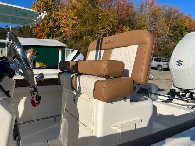 Slide: The Image of 2026 Pioneer 202 Sportfish boat on trailer, featuring Suzuki outboard motor. - 5