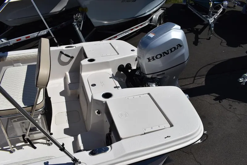 Slide: The Image of 2022 Carolina Skiff 17 LS boat with Honda outboard motor. - 10