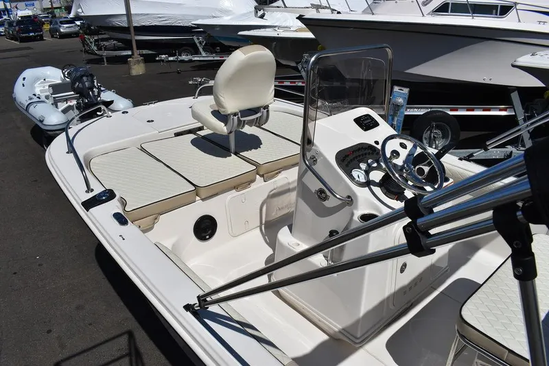 Slide: The Image of 2022 Carolina Skiff 17 LS boat interior with console and seating. - 12