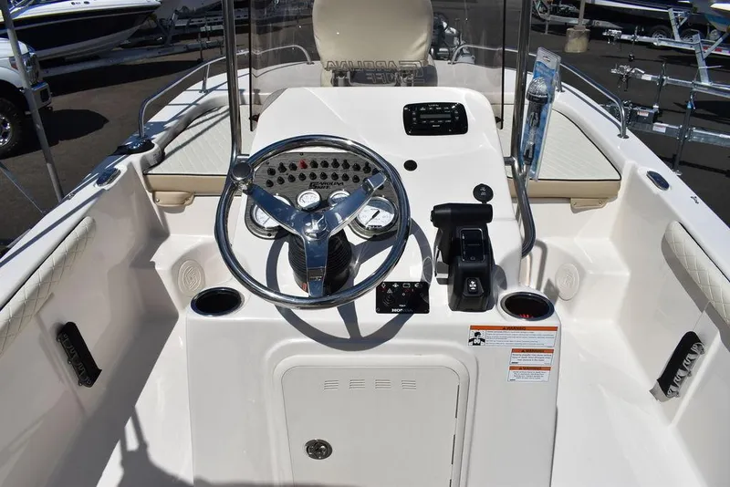Slide: The Image of 2022 Carolina Skiff 17 LS boat console with steering wheel and controls. - 20