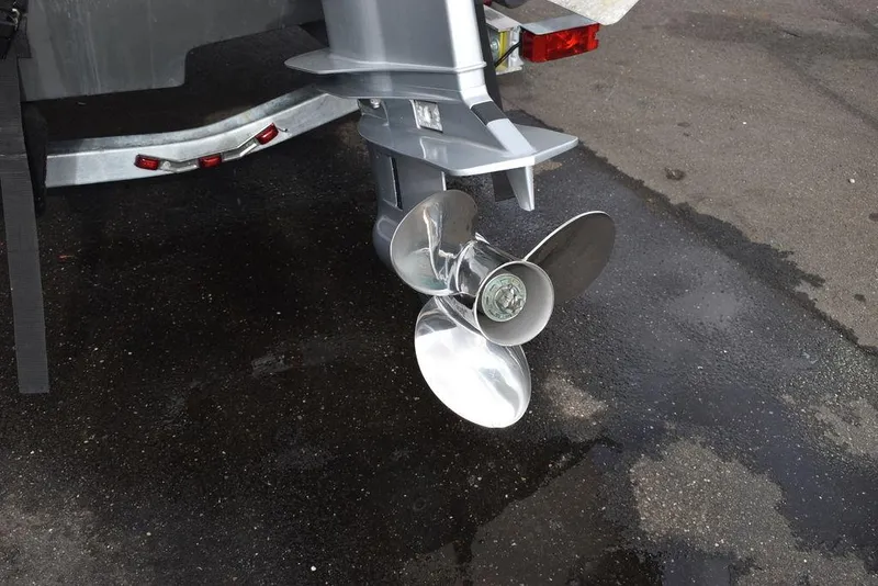 Slide: The Image of Close-up of 2022 Carolina Skiff 17 LS boat propeller and trailer. - 34