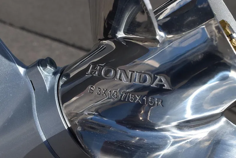 Slide: The Image of Close-up of a Honda propeller on a 2022 Carolina Skiff 17 LS boat. - 35