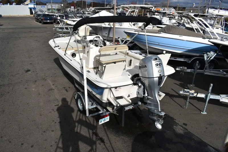Slide: The Image of 2022 Carolina Skiff 17 LS boat with Honda 90 outboard motor on trailer. - 4