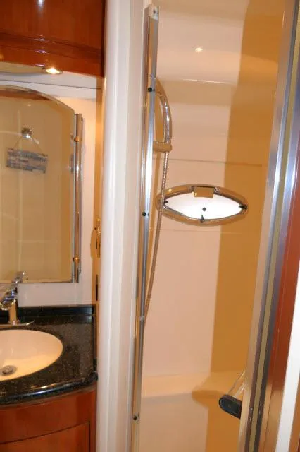 Slide: The Image of Bathroom interior of a 2001 Carver 530 Voyager Pilothouse yacht. - 28