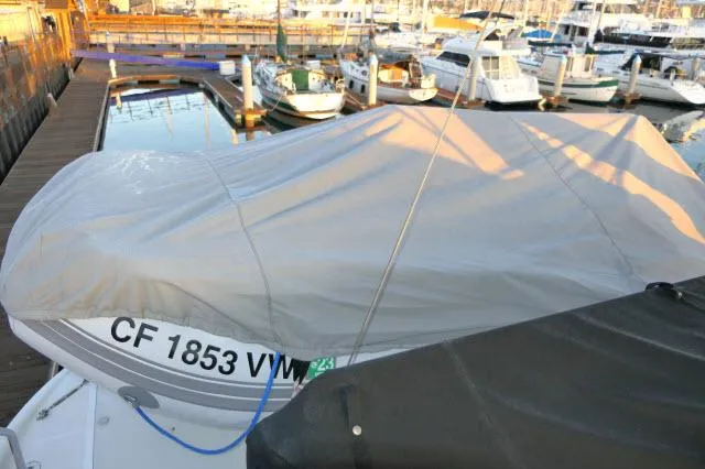 Slide: The Image of Covered 2001 Carver 530 Voyager Pilothouse docked at marina. - 46