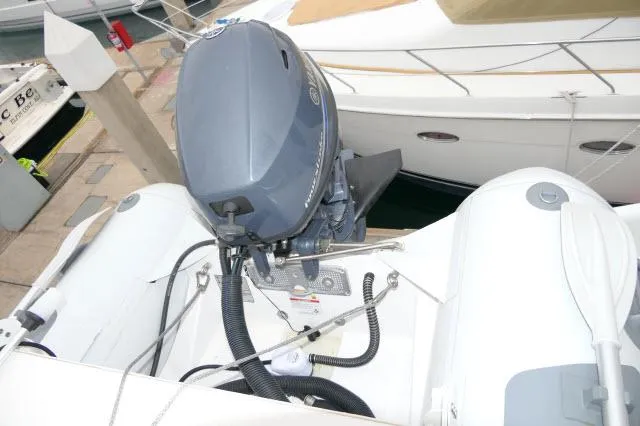 Slide: The Image of Outboard motor on a 2001 Carver 530 Voyager Pilothouse yacht at dock. - 48