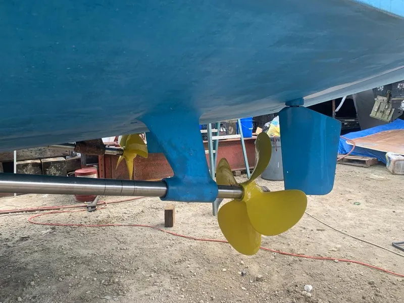 Slide: The Image of Close-up of 2003 Cabo 45 Express boat propeller and rudder. - 22