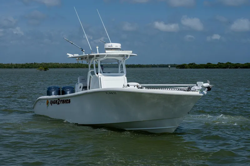 Slide: The Image of 2015 Yellowfin 32 boat cruising on a sunny day. - 1